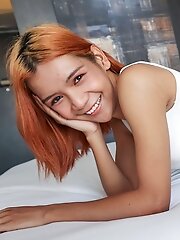 Sexy nude Thai Ladyboy gets serviced by big dick stud in Bangkok